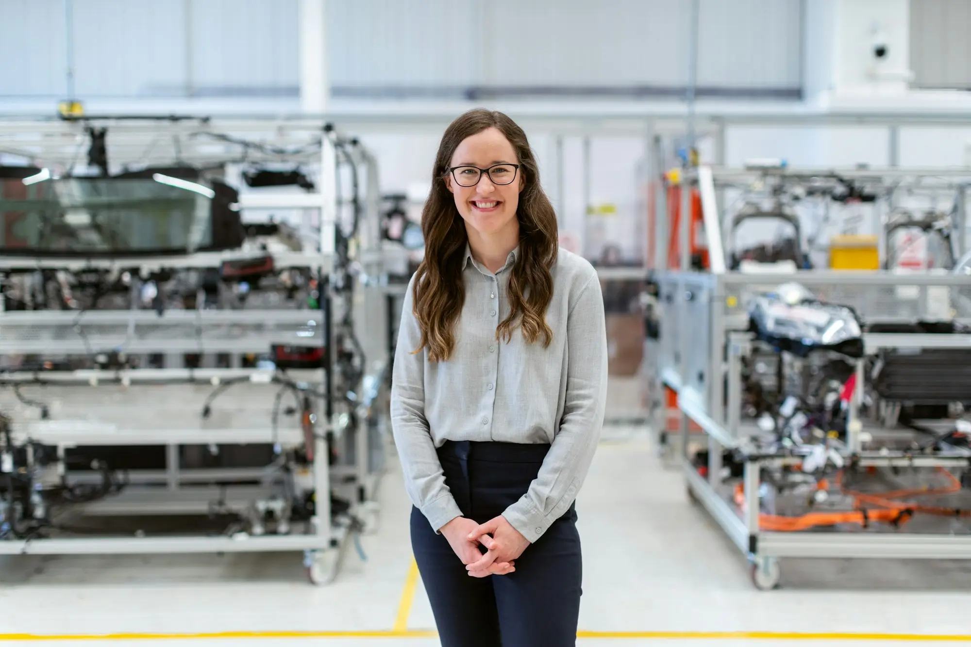 Engineer standing in a modern manufacturing facility