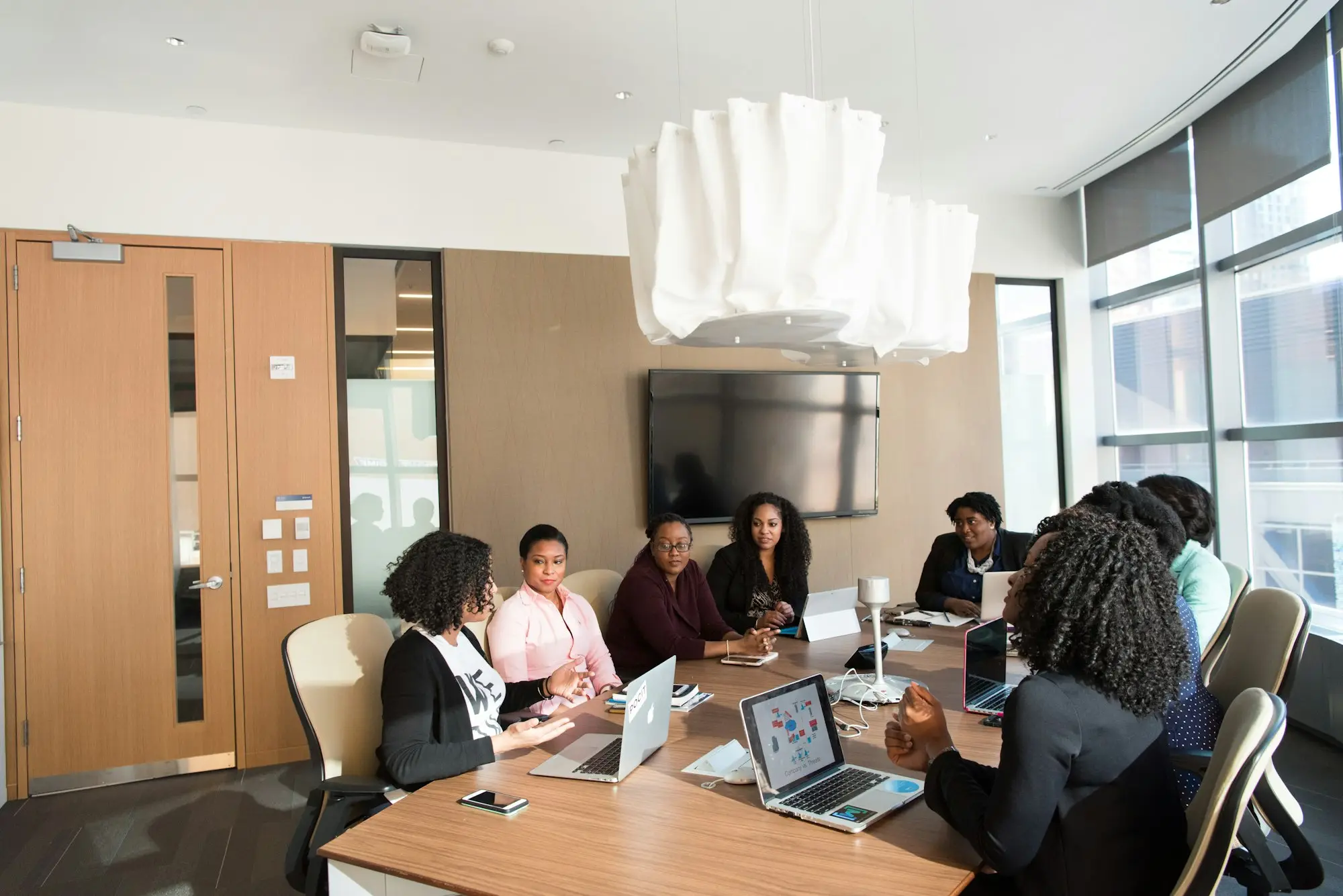 Team meeting with a major customer in a bright meeting room