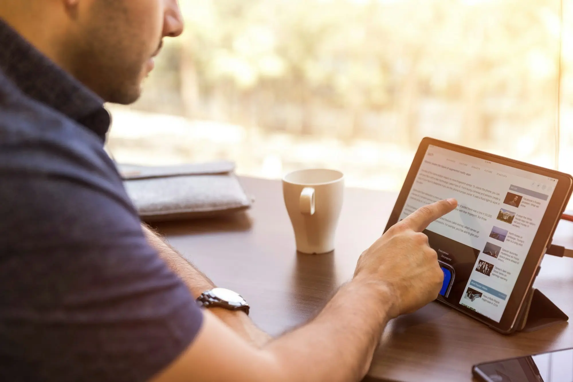 Business owner showing figures on a tablet to a buyer
